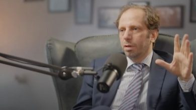 صلاحيات الهيئة الانتقالية وملاحقة الأسد عبر الإنتربول
